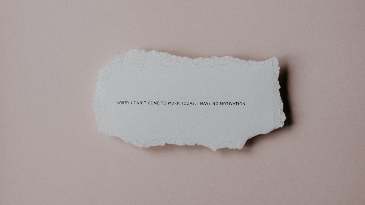 a piece of torn paper with a quote on it
